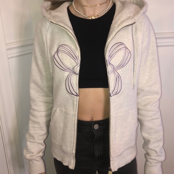 Very light grey TNA zip up with light purple logo - Picture 3 of 11